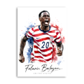 Folarin Balogun celebrating in a USA red-and-white number 20 shirt